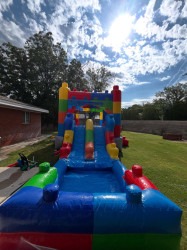 554714023 17966180363973558 4651026505977077836 n 1758838135 1 Lego Bounce House Slide Combo (WET)